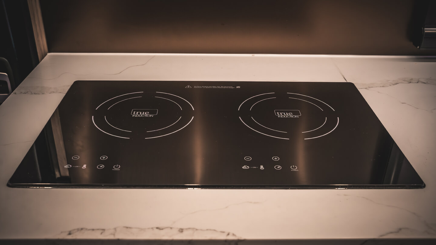 Induction cooktop on counter.