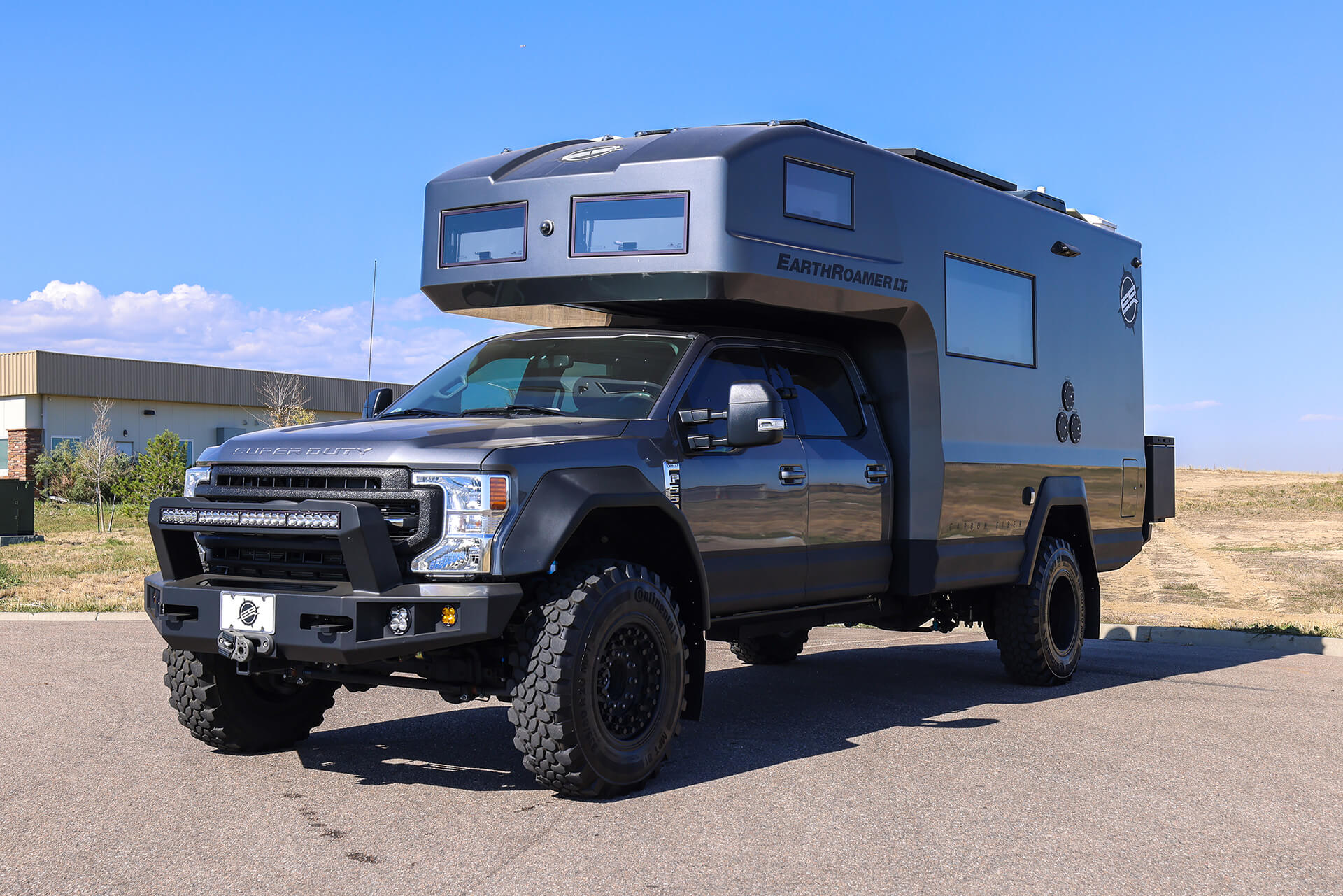 EarthRoamer XV-LTi shown in rugged outdoor environment emphasizing off-road strength.