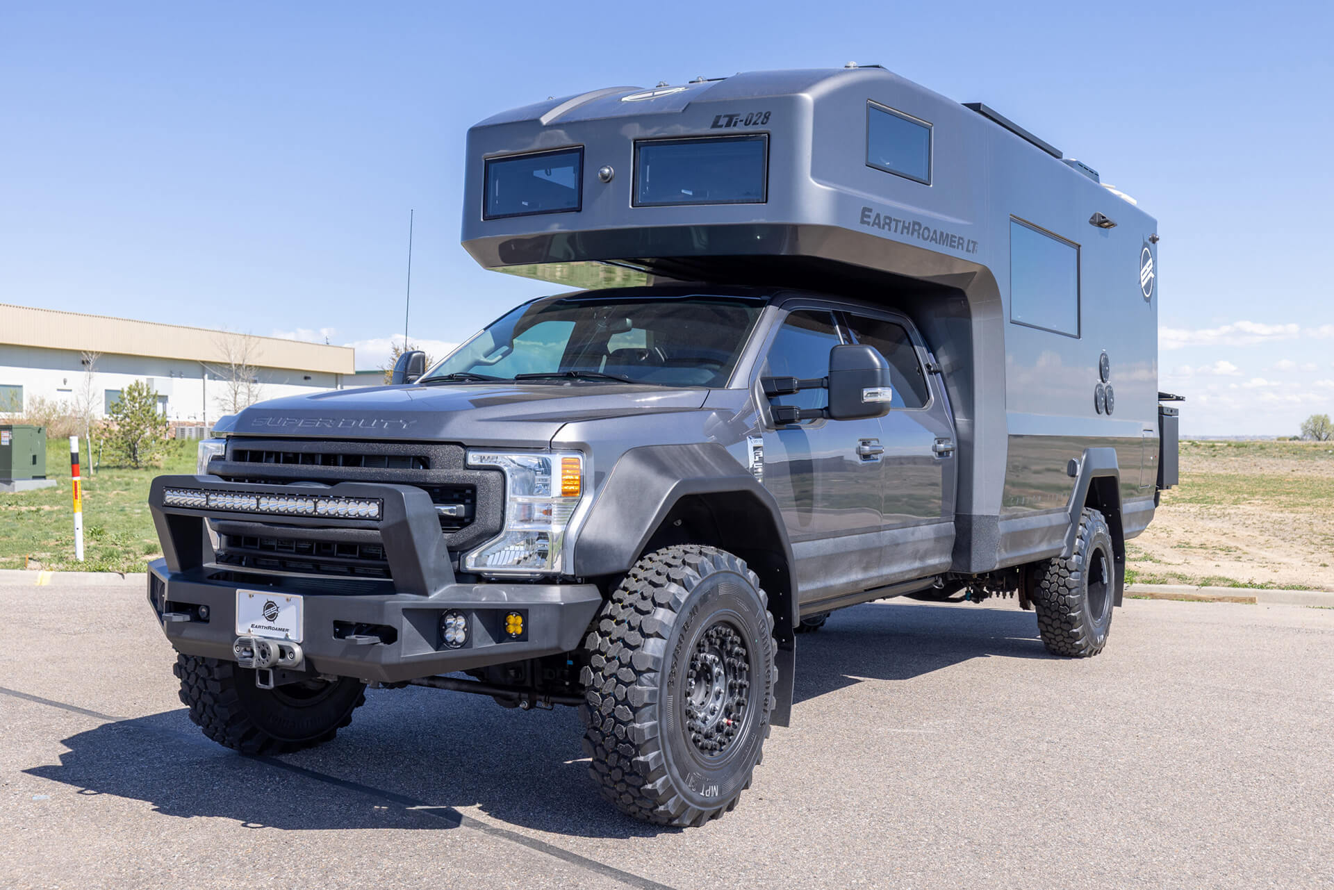 EarthRoamer LTi interior highlighting spacious kitchen and cabinetry layout.